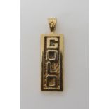 A 9ct gold ingot pendant, full London hallmarks for 1977, weight 12.3gms Condition Report: Available