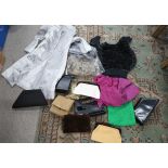 A collection of ladies leather clutch bags, a chain metal example, dresses etc Condition Report: Not