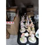 A quantity of novelty bookends and animal figures, Apulum tea cups and saucers, framed embroidery
