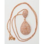 A 9ct rose gold diamond pendant and rose gold plated silver chain, weight of the pendant 4.5gms, set