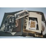 An album of various vintage photographs and postcards Condition Report: Available upon request