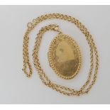 A 9ct locket and chain, locket approx 4.6cm x 2.7cm, including bail, belcher chain length 52cm,