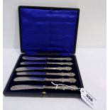 A cased set of six silver handled butter knives unclear marks Condition Report: Available upon