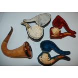 Three carved Meerschaum pipes and other pipes Condition Report: Available upon request