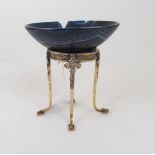 A silver-gilt stand with outswept feet and oval dish, 4in. high (af) Condition Report: Available