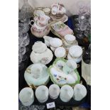 A selection of lady artists hand painted tea cups and saucers, painted initials A P H to base, a