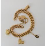 A 9ct gold curb link charm bracelet with heart shaped clasp and four 9ct charms, weight 24gms