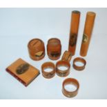 Ten various items of Mauchline ware including money banks, needle cases etc Condition Report: