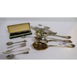 A lot comprising a silver tablespoon London 1826, a pair of silver serving spoons Sheffield 1908,