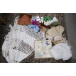 Assorted ladies gloves, a knit wool blanket, ladies clutch bags, a nylon scarf etc Condition Report: