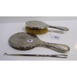 A three piece silver backed dressing table set Sheffield 1908 Condition Report: Available upon