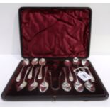 A cased set of twelve silver spoons with tongs, no town mark Condition Report: Available upon
