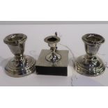 A lot comprising a pair of silver dwarf candlesticks Birmingham 1991 & a candlestick with integral
