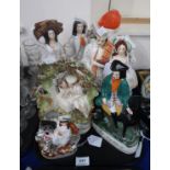A group of Staffordshire figures including Dick Turpin, Robert & Mary Burns, a group of a couple,