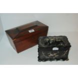 A Victorian mahogany two division tea caddy and a papier mache and mother of pearl inlaid tea