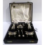 A cased five piece silver condiment set, Sheffield 1962 Condition Report: Available upon request