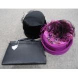 A ladies pink cloche hat with ostrich feather and velvet flower applique, another black velvet