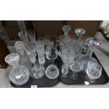 A selection of cut glass and crystal drinking glasses, cut glass decanters, one with EPNS collar,