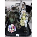 A glazed terracotta figure of a Nun, another stoneware example, a green glazed ewer, a Lladro figure