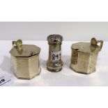 A lot comprising a pair of silver mustard pots, London 1896 bearing a crest & a silver pepper pot (