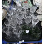 A selection of cut glass and crystal drinking glasses, some with frosted decoration & a pair of