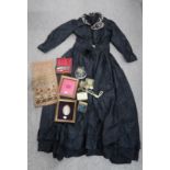 A Victorian Sampler by Agnes Carrick, a late 19th/early 20th century silk mourning dress with