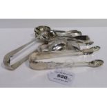 A lot comprising fourteen assorted silver teaspoons & three pairs of sugar tongs 408 grams (17)
