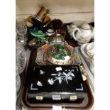 A lot comprising a lacquered and mother of pearl inlaid musical jewellery box, a Japanese green