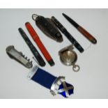 Four various vintage pens, pocket compass, silver and enamel medallion etc Condition Report: