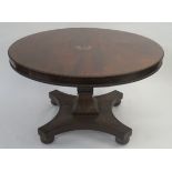 A VICTORIAN MAHOGANY CIRCULAR BREAKFAST TABLE with gadroon rims, on square tapering column divided