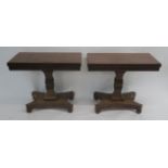 A PAIR OF VICTORIAN MAHOGANY TEA TABLES the hinged tops with gadroon rims on square tapering columns
