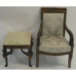 AN EMPIRE PERIOD MAHOGANY ARMCHAIR AND STOOL the upholstered seat with scroll rail above gilt