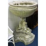 A LARGE CAST GARDEN URN the substantial lobed bowl with vines and acanthus leaf resting on