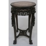 A CHINESE ROSEWOOD PEDESTAL the marble inset top with beaded border above a carved and pierced
