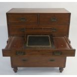 A VICTORIAN CAMPHORWOOD MILITARY CAMPAIGN SECRETAIRE CHEST the twin sections fitted with brass