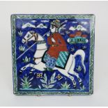 A PERSIAN (DAMASCUS) TILE painted with a warrior on horseback before a palace, 20 x 20cm Condition