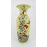 A ROBERT HERON AND SON FIFE POTTERY VASE painted with a maiden in a landscape, flanked by flowers,