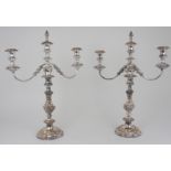 A PAIR OF LATE 19th / EARLY 20th CENTURY THREE LIGHT CANDELABRA in two parts with removable drip