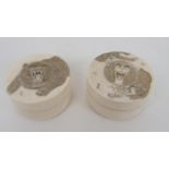 TWO JAPANESE IVORY BOXES AND COVERS one carved with a bear the other with monkeys, signed, 6.5cm