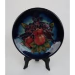 A MOORCROFT FINCHES AND BERRIES PATTERN PLATE 26cm diameter Condition Report: No chips or cracks.