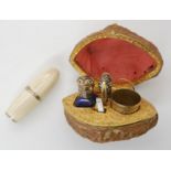A CHARMING WALNUT SHELL ETUI AND GUILLOCHE ENAMEL SCENT BOTTLE etui; the silver gilt thimble and