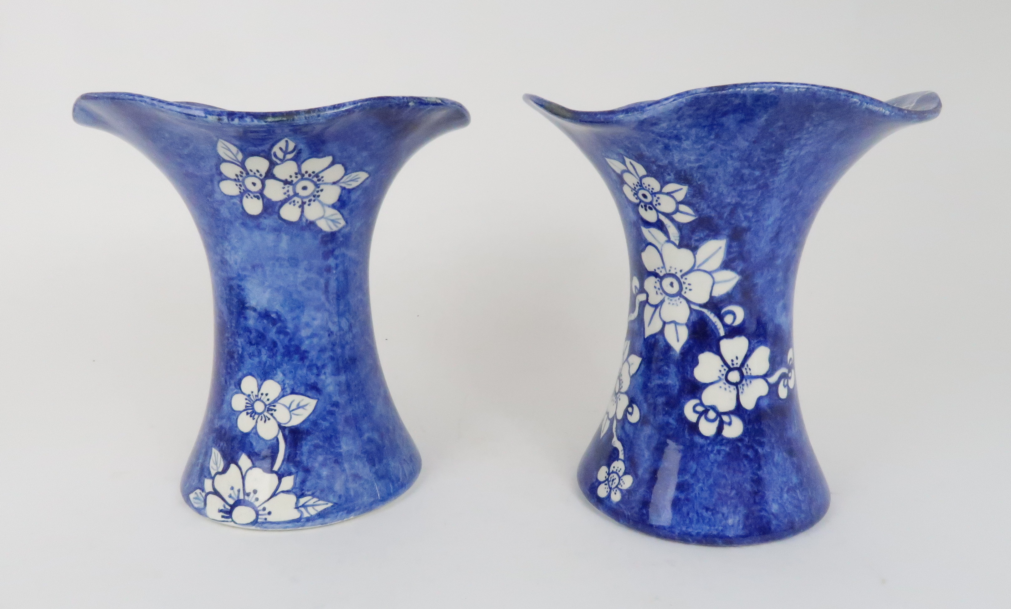 A PAIR OF FIFE POTTERY VASES of Lady Eva shape painted in blue on white ground with prunus branches,