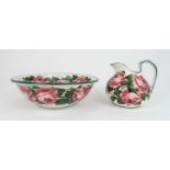 A SMALL ROBERT HERON AND SON WEMYSS WARE EWER AND BASIN painted with cabbage roses, impressed mark