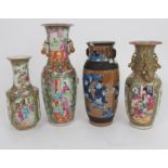 FOUR CANTONESE VASES two baluster examples with applied animals, 25 and 31cm high, another, 21.5cm
