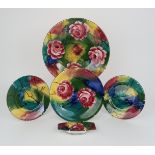 A COLLECTION OF JAZZY WEYMSS PIECES including a charger, 31.5cm diameter, a plate, 23cm diameter,