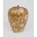A SATSUMA LOBED POT POURRI VASE AND COVER painted all over with chrysanthemum, raised on three