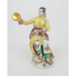 A 20th CENTURY MEISSEN FIGURE OF A SEATED ORIENTAL LADY PLAYING THE CYMBALS with floral