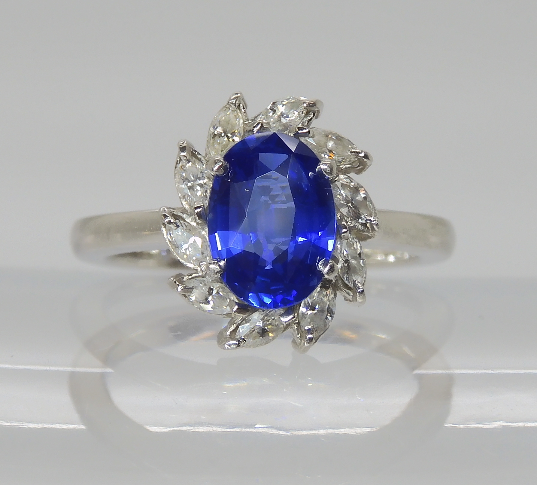 A PLATINUM SAPPHIRE AND DIAMOND RING made by Blair & Sheridan, the 8.2 x 5.9 x 3.5mm sapphire is - Image 2 of 5
