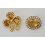 A SHAMROCK SHAPED CITRINE AND PEARL BROOCH mounted in 9ct gold, hallmarked London 1964, dimensions