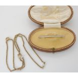 A VINTAGE PEARL NECKLACE AND BROOCH the milled trace chain is set with three natural pearls along